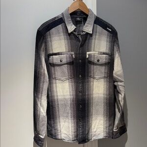 Large Harley-Davidson Black Plaid Shirt. Snaps up,no stains used good condition